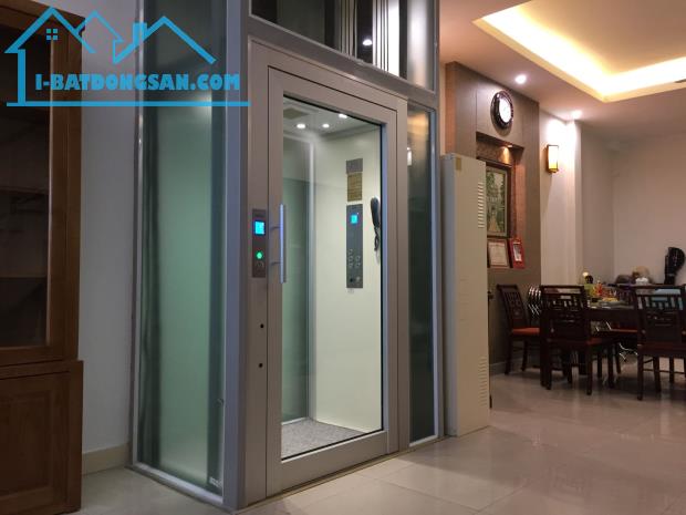 Cần bán nhà 7 tầng thang máy Phố Nguyễn Ngọc Nại , ô tô vào nhà , giá 9,9 tỷ lh 0911002289