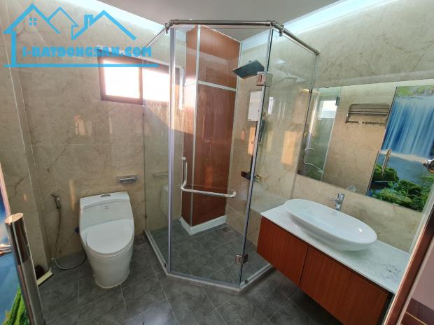 Bán nhà mặt phố Hoàng Cầu Đống Đa 215m2 mt9m 8 tầng thông sàn thang máy gara oto 110 tỷ . - 1