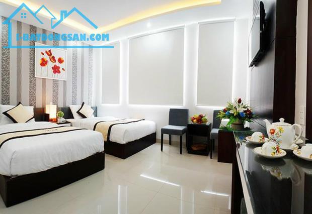 Cạnh sân bay Bán gấp nhà nghỉ 3.5 tầng 165m2 ( 7.5 * 22 ) đường 33m Lê Đại Hành 0838800215 - 3