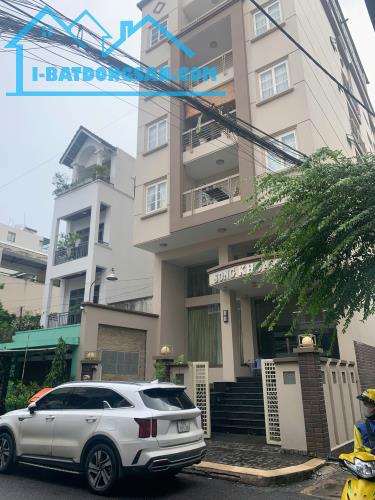 Hầm-7 tầng góc 2MT hẻm 10m đường Hoàng Văn Thụ-Út Tịch Tân Bình giá 74.9 tỷ - 1