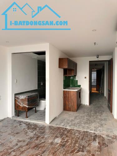 Mặt phố Nguyễn Khuyến 9 tầng - lòng đường 50m, dừng đỗ trước cửa - kinh doanh sầm uất - 2