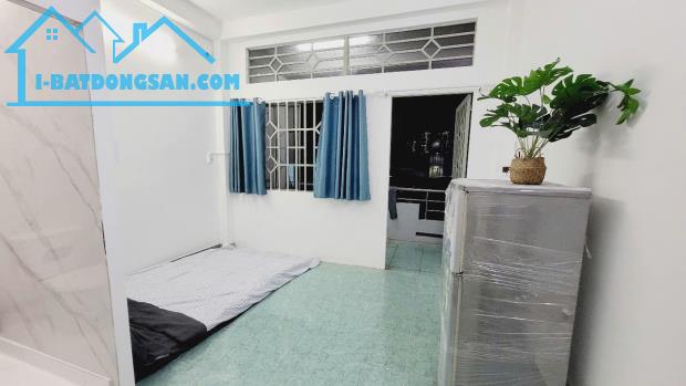 Căn hộ dịch vụ ban công cửa sổ full nội thất 35m2 bếp riêng tại Tân Hưng