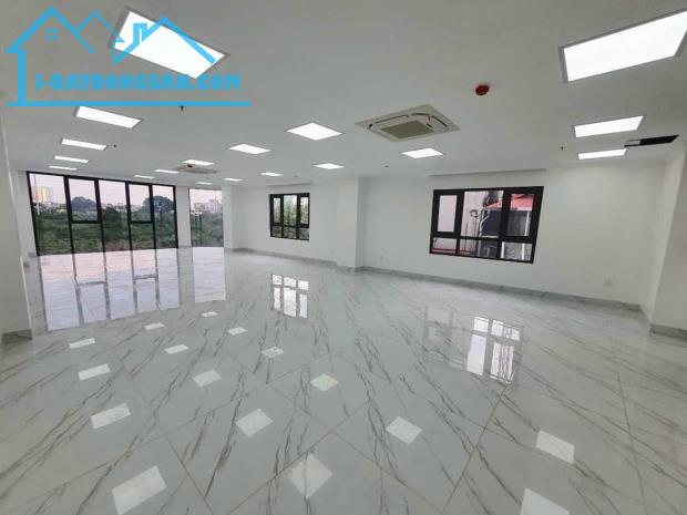 Bán toà VP 9 tầng Hoàng Quốc Việt - 125m2 căn góc có hầm, thông sàn, 2 làn ô tô kinh doanh - 1