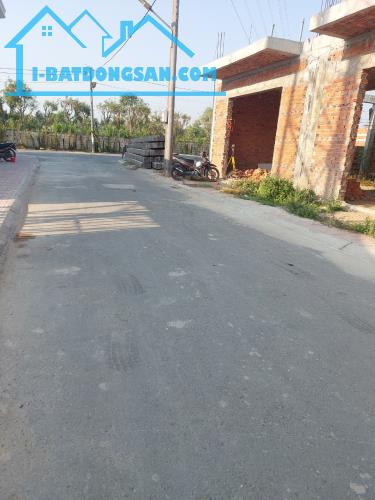Bán 100m2 đất thổ cư mặt tiền QL1A chợ Tân Hiệp - 1