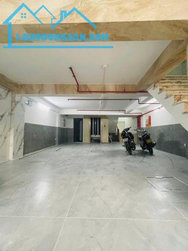 TÒA NHÀ VĂN PHÒNG - LÊ_ĐỨC_THỌ - DT 115M2- NGANG 7M – 9 TẦNG + HẦM ĐỂ XE – OTO TRÁNH - 1
