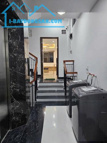 Nhỉnh 30 tỷ có CHDV 7 lầu T.máy hẻm 8m QL 13 150m2 ngang 5.5m 17PN thu nhập 120tr. - 2