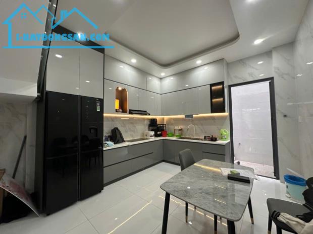 NHÀ MỚI 100% -  Ô TÔ NGỦ TRONG NHÀ - 4 TẦNG - 4PN - HẺM THÔNG 5M - NGAY TRUNG TÂM QUẬN 10 - 2