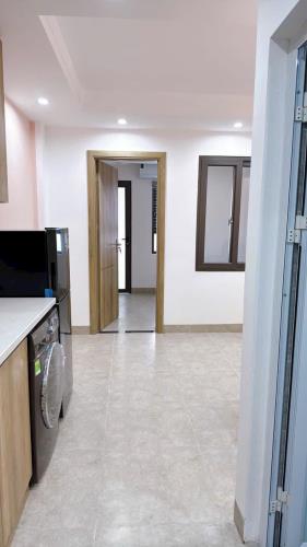 BÁN NHÀ - 11 PHÒNG (1 NGỦ + 1 KHÁCH) - TT ĐỐNG ĐA - LÔ GÓC - 7 TẦNG THANG MÁY - 80M RA PHỐ