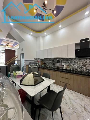 MẶT TIỀN 8M - NGUYỄN THƯỢNG HIỀN P6 BÌNH THẠNH - 4 TẦNG - 6PN LỚN - CHỦ GẤP BÁN ĐỊNH CƯ - - 2