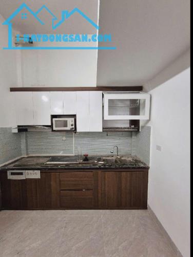 NHÀ PHỐ ĐẶNG TIẾN ĐÔNG-50M RA MẶT ĐƯỜNG-TRUNG TÂM ĐỐNG ĐA-XUNG QUANH BẠT NGÀN TIỆN ÍCH - 2