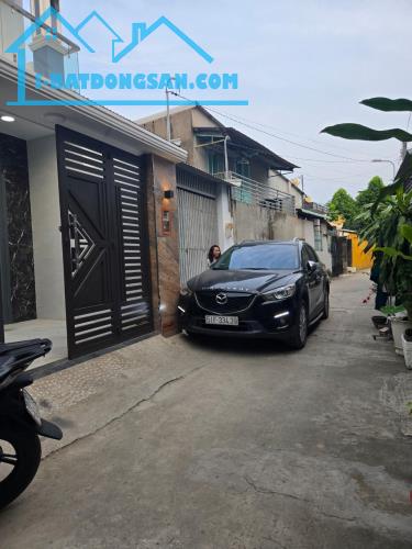 Bán nhà 3 tầng 65m2 HXH, Phước Thiện, Long Bình, Vinhomes Quận 9 giá chỉ 5,x tỷ - 1