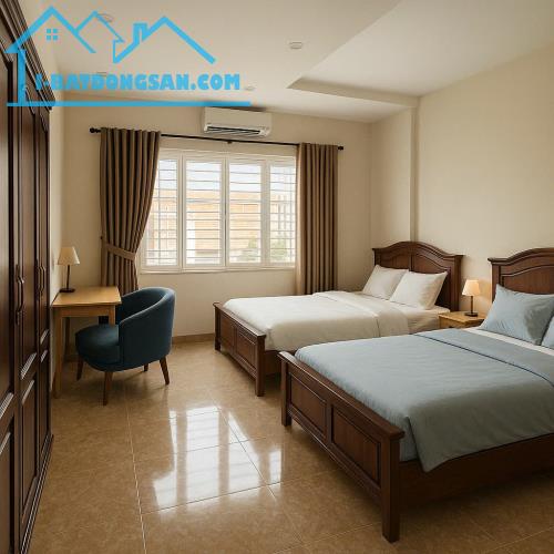 BÁN NHÀ 4.5 TẦNG MẶT TIỀN ĐƯỜNG PHẠM VĂN ĐỒNG - 4