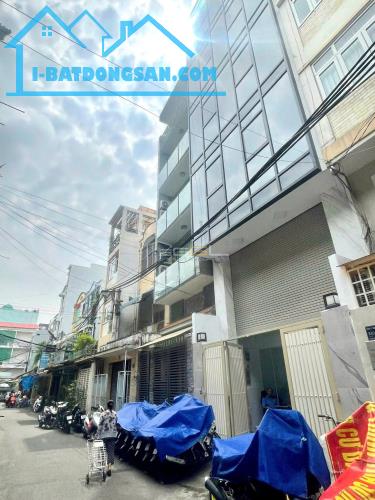 Toà nhà văn phòng HXH 175/37 Nguyễn Thiện Thuật - P.1 - Q.3 - 5