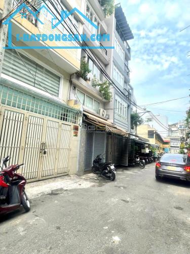 Toà nhà văn phòng HXH 175/37 Nguyễn Thiện Thuật - P.1 - Q.3 - 4