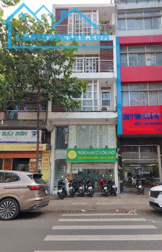 Bán nhà mặt tiền chợ Tân Sơn Nhất DT 4x20,5m 4 tầng xây cao cấp, giá 16 tỷ TL