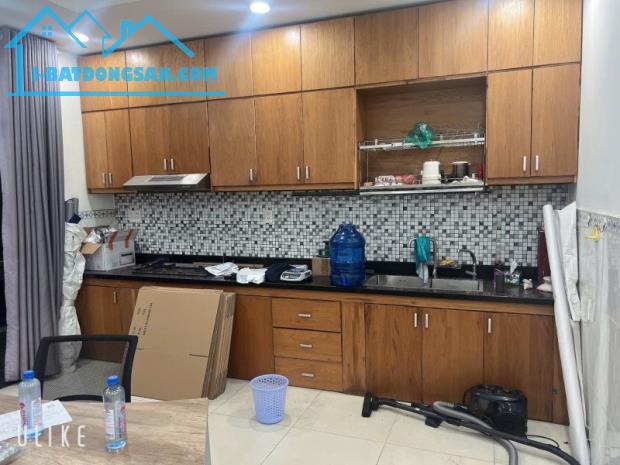 Bán nhà 1 Trệt 2 Lầu Trung Tâm Dĩ An 104m2,đường xe hơi,gần trường Câp 3 Dĩ An