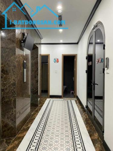 (Tin thật 100%) Bán tòa nhà VP 3 mặt tiền ô tô tránh 186m2 x 8T tại phố Trần Thái Tông - - 2