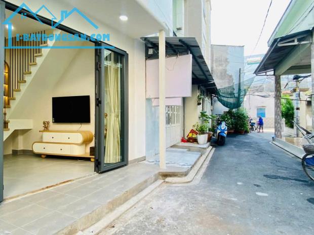 Bán nhà hẻm xe hơi 4m đường Quang Trung, P.14, 7 x 7, 2 tầng, 3PN giá 4.95 tỷ tl - 5