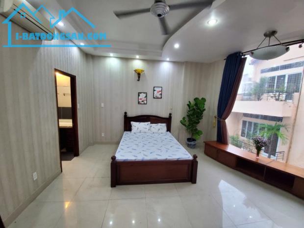 BÁN NHÀ PHÚ NHUẬN OTO VÀO NHÀ 70M2 5 TẦNG NGANG 5.5M 7 PN HẺM THÔNG KD CHDV NGUYỄN ĐÌNH - 2
