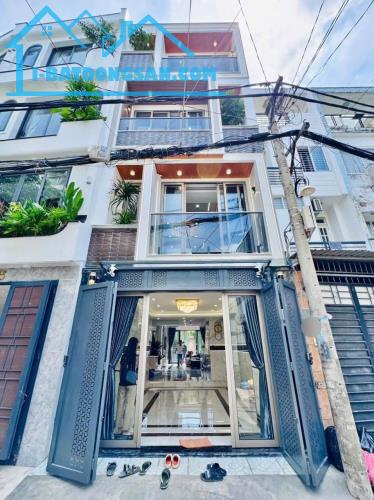 Bán nhà hẻm 5m thông Quang Trung, P.8, 4 x 19,thang máy giá 10.4 tỷ tl